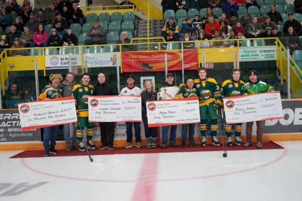 Dawg Nation present scholarships to 3 lucky Humboldt Broncos